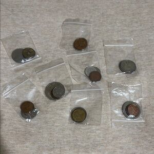 3 Assorted Foreign Coins in Clear Bags